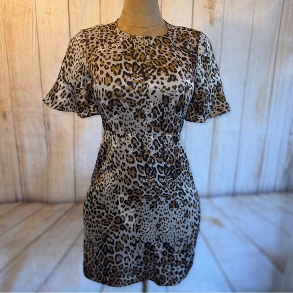 Banana Republic Dresses & Skirts - Banana Republic Black and tan leopard/ cheetah animal print Sheath Dress, satin‌
